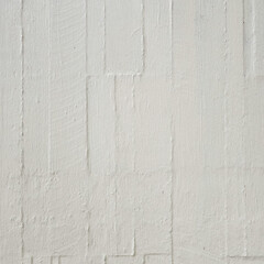 White plaster wall texture with subtle concrete lines, perfect for minimal background or architectural design use.