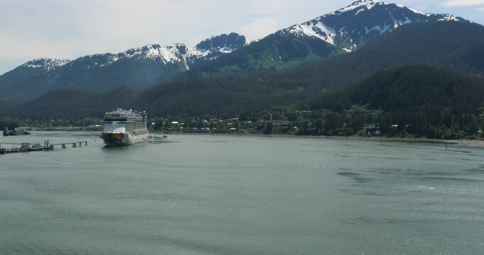Cruise ship approaching the port of Juneau, Alaska. Mount Bradley on Douglas Island in the background.