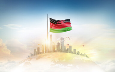 Malawi flag wavering on globe with modern building skyline. Flag waving on world map. Malawi national flag for independence day.