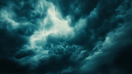 Storm clouds loom over the prairie, a vast sky in moody blues and greys, evoking nature's raw power and solitude.