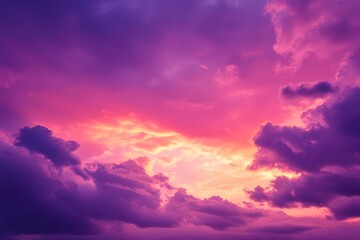 Fototapeta premium A breathtaking celestial display of vibrant colors engulfs the sky, creating a beautiful and captivating scene. Witness the artistry of nature's painting during a magnificent sunset.