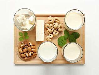 Wooden Serving Tray of Vegan Milk and Cream