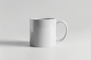 Obraz premium A minimalist white mug set against a soft gray background, perfect for a cozy coffee moment or creative design project isolated on transparent background