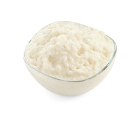 Delicious rice pudding in bowl isolated on white