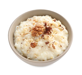 Delicious rice pudding with walnuts in bowl isolated on white
