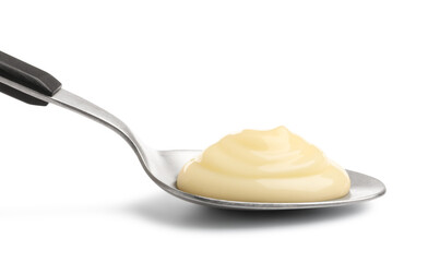 Tasty vanilla pudding in spoon isolated on white