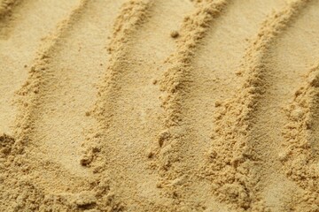 Superfood. Mustard seeds powder as background, closeup