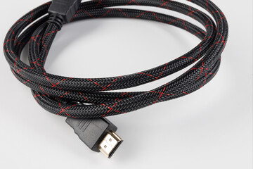 HDMI cable on a white background in a black and red box.