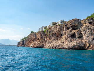 Сoastal cliffs. The blue Mediterranean Sea. Antalya, Turkey