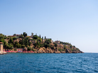 Сoastal cliffs. The blue Mediterranean Sea. Antalya, Turkey