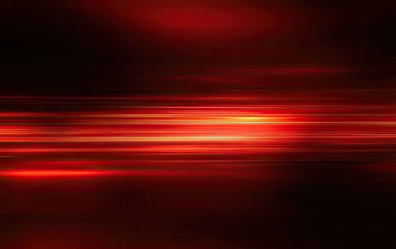 Abstract streaks in glowing warm red and orange light trails over dark background