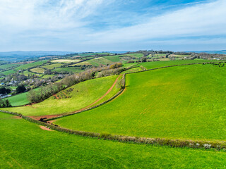 Naklejka premium Farms and Fields over Torquay from a drone, Devon, England