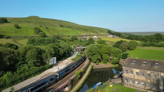 Drone footage of a train entering Standedge Tunnel, Marsden, Huddersfield, West Yorkshire