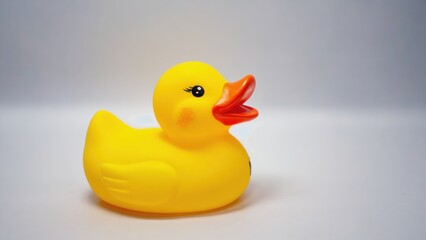 A classic yellow rubber duck, popular among children for playful and educational bath time. Can be used as a decorative item in a child's bathroom.