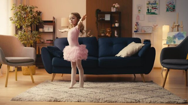 Girl in tutu dress practicing ballet moves at home, preparing for competition