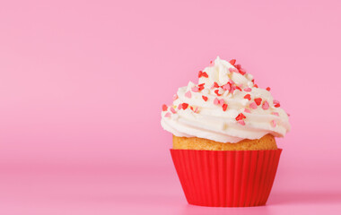 Festive cupcake topped with swirled frosting
