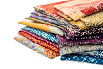 Fabric swatches cut for quilting project.