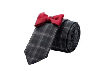 Elegant black plaid tie and bow tie ensemble rolled together for stylish occasions isolated on transparent background