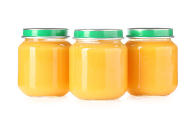 Baby food. Tasty puree in glass jars isolated on white