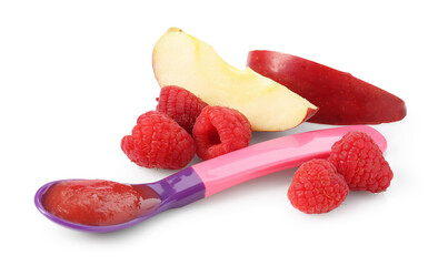 Baby food. Tasty puree in spoon, apple and raspberries isolated on white