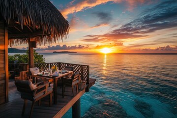 A secluded overwater bungalow with panoramic ocean views and a private deck. The minimalist yet high-end decor, infinity plunge pool, and direct lagoon access define island luxury. A couple enjoys bre