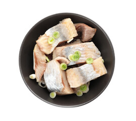 Pieces of delicious herring with green onions isolated on white, top view