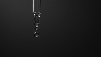 Close-up of a Pipette Dropping Liquid on a Dark Background