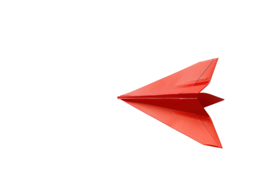 A vibrant red paper airplane poised on a light background, ready for takeoff in a playful moment isolated on transparent background