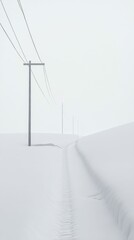 Serene winter landscape featuring power lines stretching across a snow-covered field