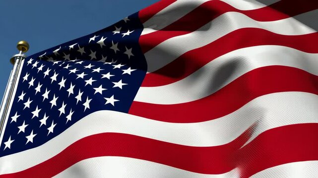 Majestic american flag waves elegantly in clear blue sky with fluid motion