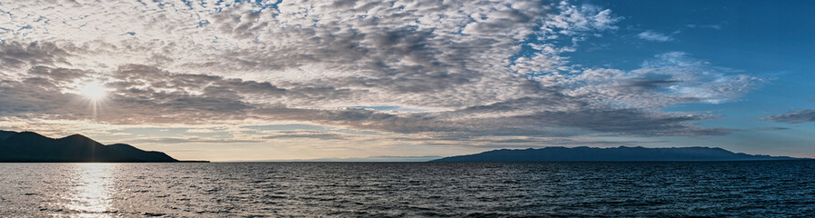 Panoramic summer view of Barguzinsky bay, lake Baikal, Russia