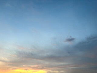 Beautiful sky with natural gradations. Thick clouds in the dusk sky on a winter night. Image of a cloudy sky in the afternoon. View of the night sky with golden light from the evening sun
