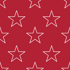 Obraz premium A repeating vector pattern of white outlined stars on a red background, creating a bold and festive design.