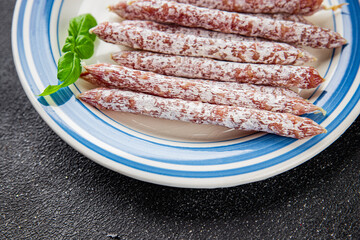 Sausage aperitif salami meat natural food dish organic product fresh tasty gourmet food background on the table rustic food top view copy space