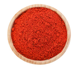 Red pepper powder in bowl isolated on white, top view