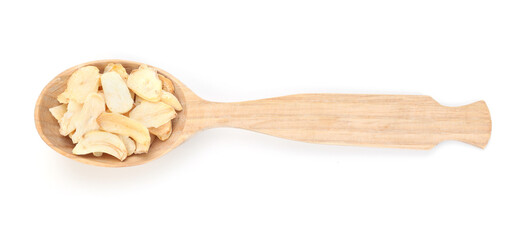 Dried garlic in wooden spoon isolated on white, top view