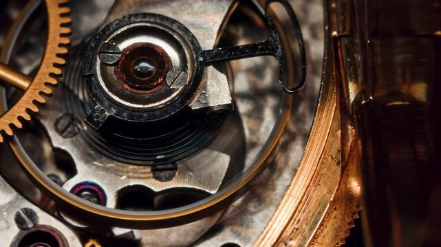 A dynamic shot of an old pocket watch mechanism, focusing on the rotating gears and the delicate balance of timekeeping. The fine golden gears and mechanical components reveal expert craftsmanship.
