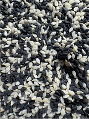 Close-up of mixed black and white sesame seeds