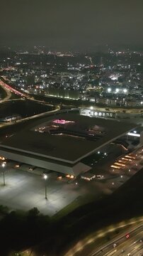 Itaquera neighborhood in S&atilde;o Paulo at night. Aerial view. Vertical video.