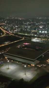 Itaquera neighborhood in S&atilde;o Paulo at night. Aerial view. Vertical video.