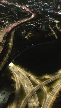 Itaquera neighborhood in S&atilde;o Paulo at night. Aerial view. Vertical video.