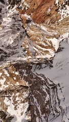 Photo of landscape texture of rocky mountains with snow. Dolomites. UNESCO heritage