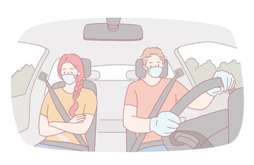 Two individuals wearing protective masks inside a car, showcasing the importance of safety measures during a pandemic