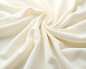 Obraz premium Elegant ivory fabric with soft flowing folds, creating a luxurious and serene texture for backgrounds and design elements in fashion and interiors