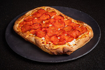 A mouthwatering pepperoni pizza with a golden crust and rich toppings ready to be enjoyed