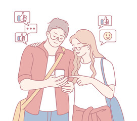 A cheerful and playful couple are joyfully using a smartphone together, enjoying social media engagement and connection