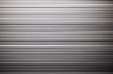 Obraz premium Corrugated metal sheet creating a striped metallic background
