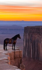 Brown Horse Gazing Over Canyon Edge at Sunset in Monument Valley Landscape Arizona Desert