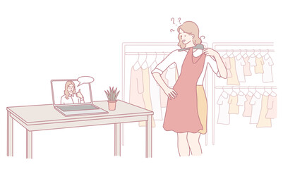 A woman is utilizing a virtual dressing room to try on various clothes with the help of an online fashion advisor