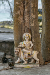 statue or murti of Maa Durga under the tree